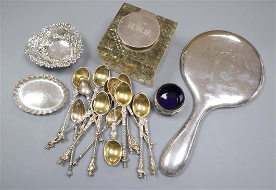 A silver mounted inkwell, continental tea spoons, silver hand mirror, silver pin dishes and a silver salt.